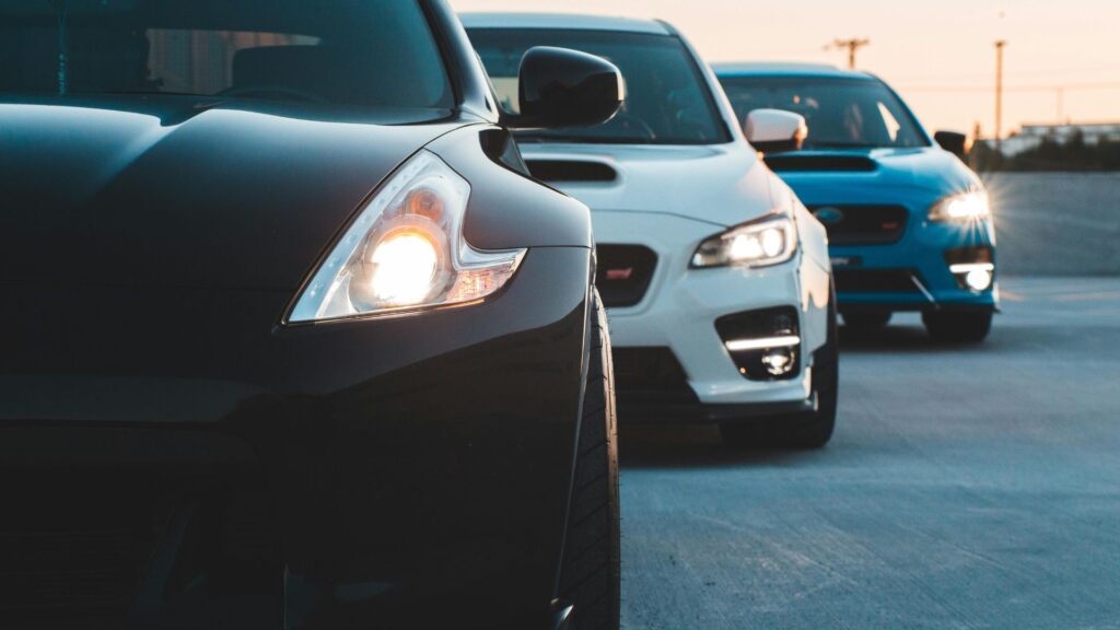 close up of 3 three cars